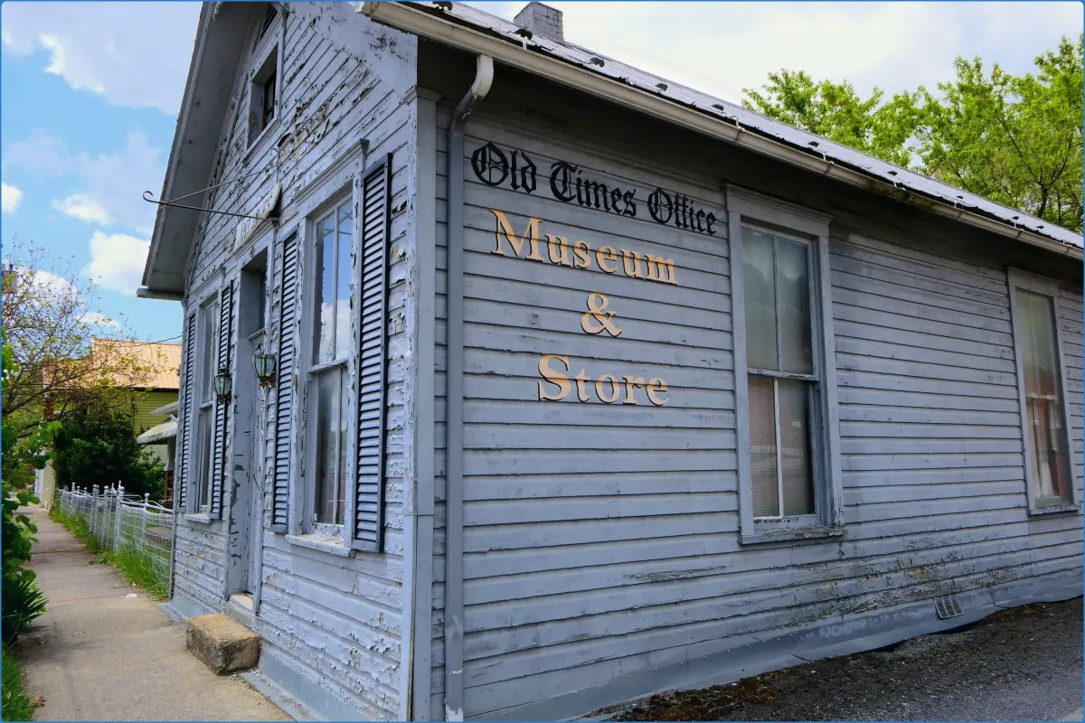 Old wooden building labeled Museum & Store