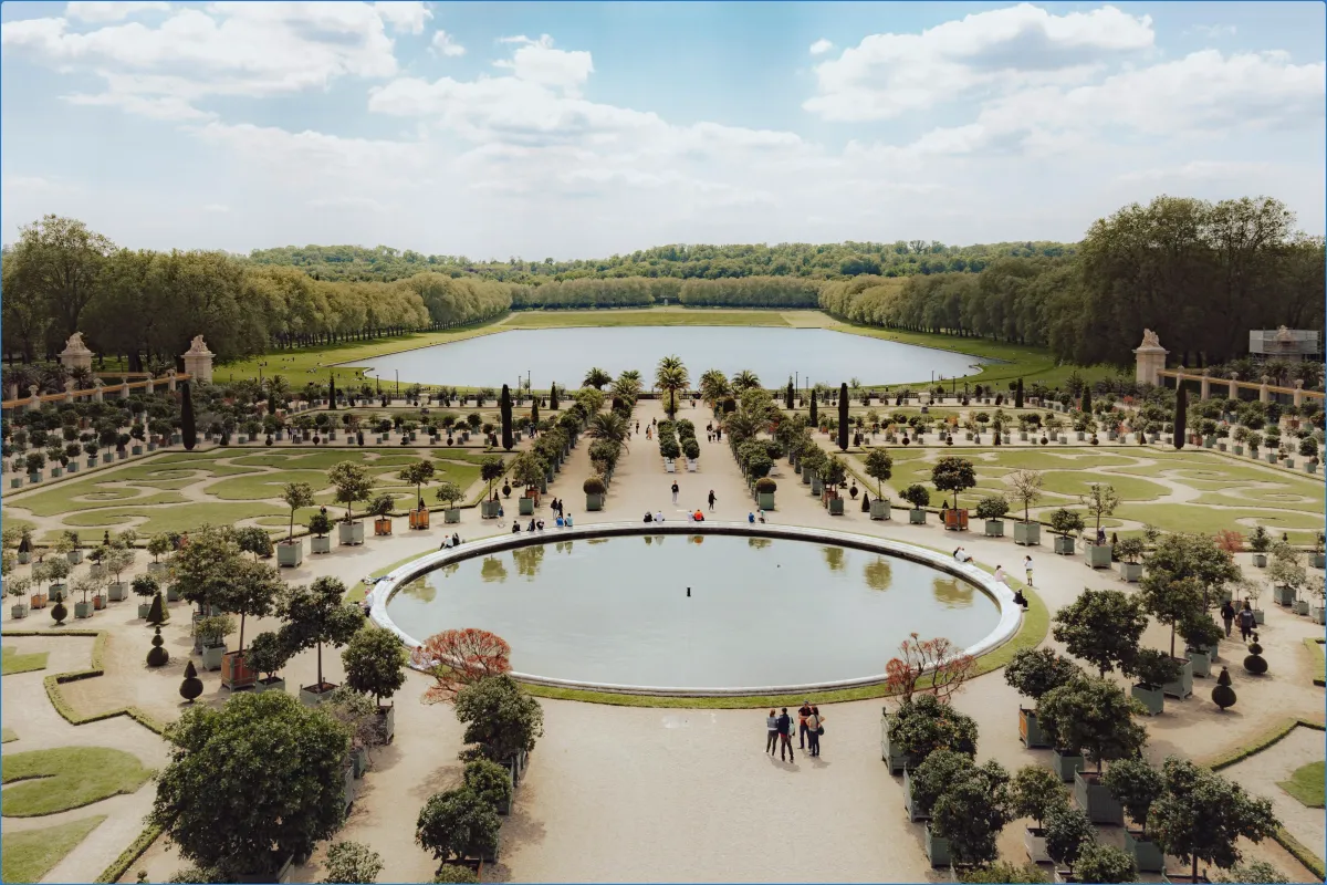 Ornate garden with fountain and trees